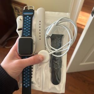 New Apple Watch SE with two bands and a charger